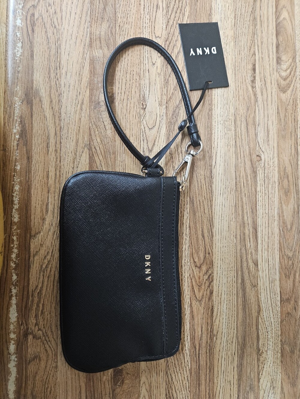 NWTs DKNY Black Textured Leather Wristlet with Gold Logo
